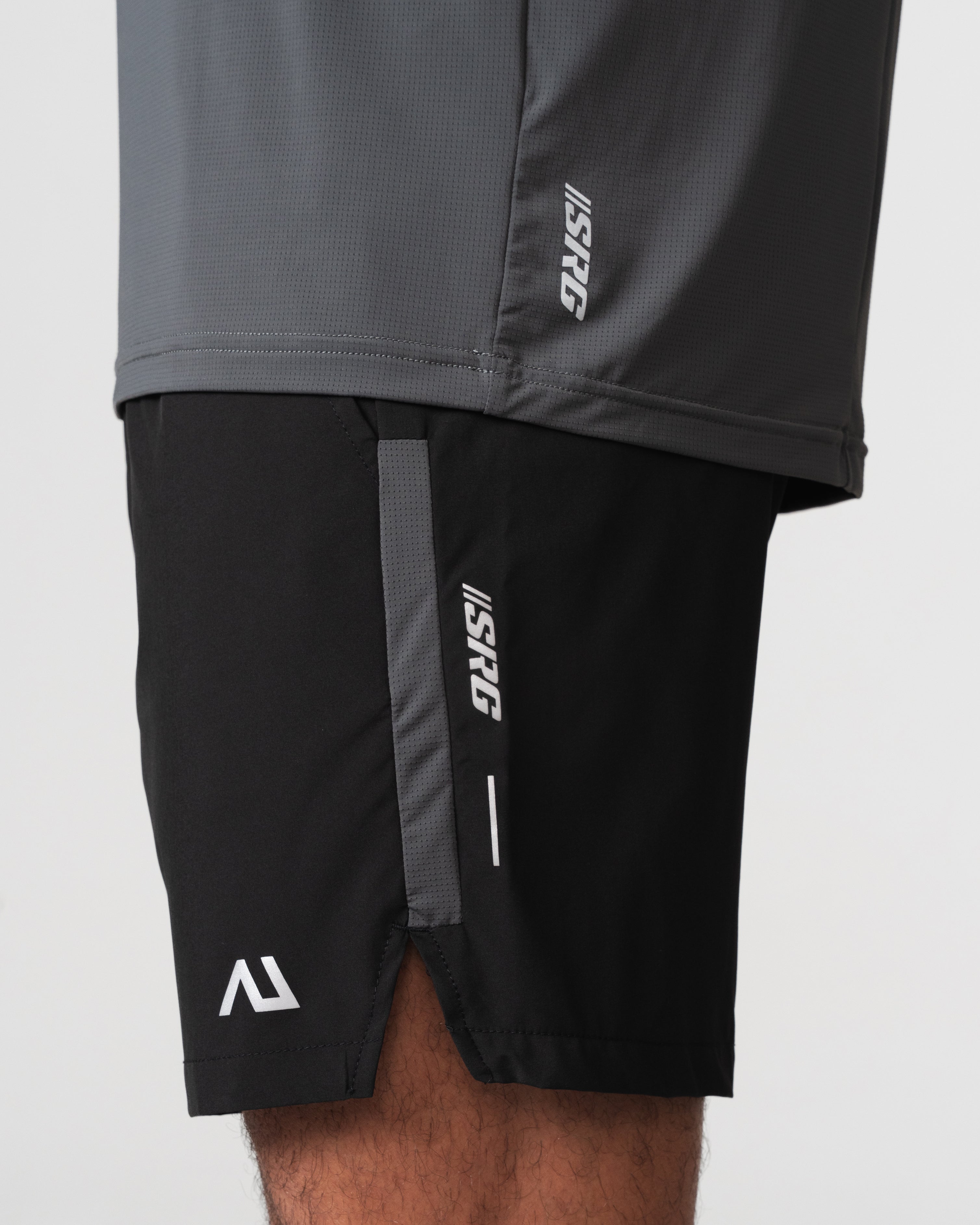 SRG Short in Carbon Black, close-up of hem, side vent and SRG taping