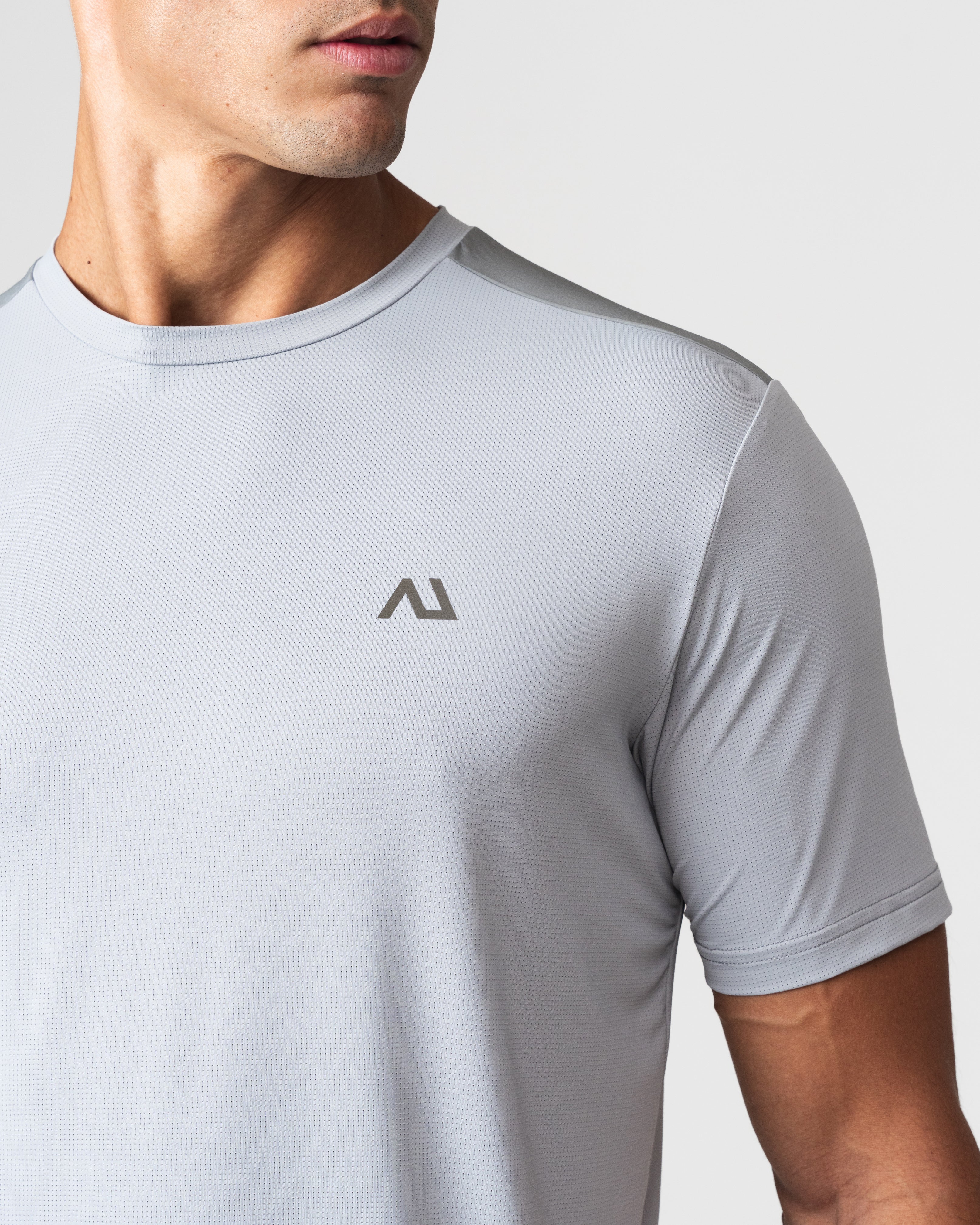 SRG T-Shirt in Titanium Grey, close-up of chest logo