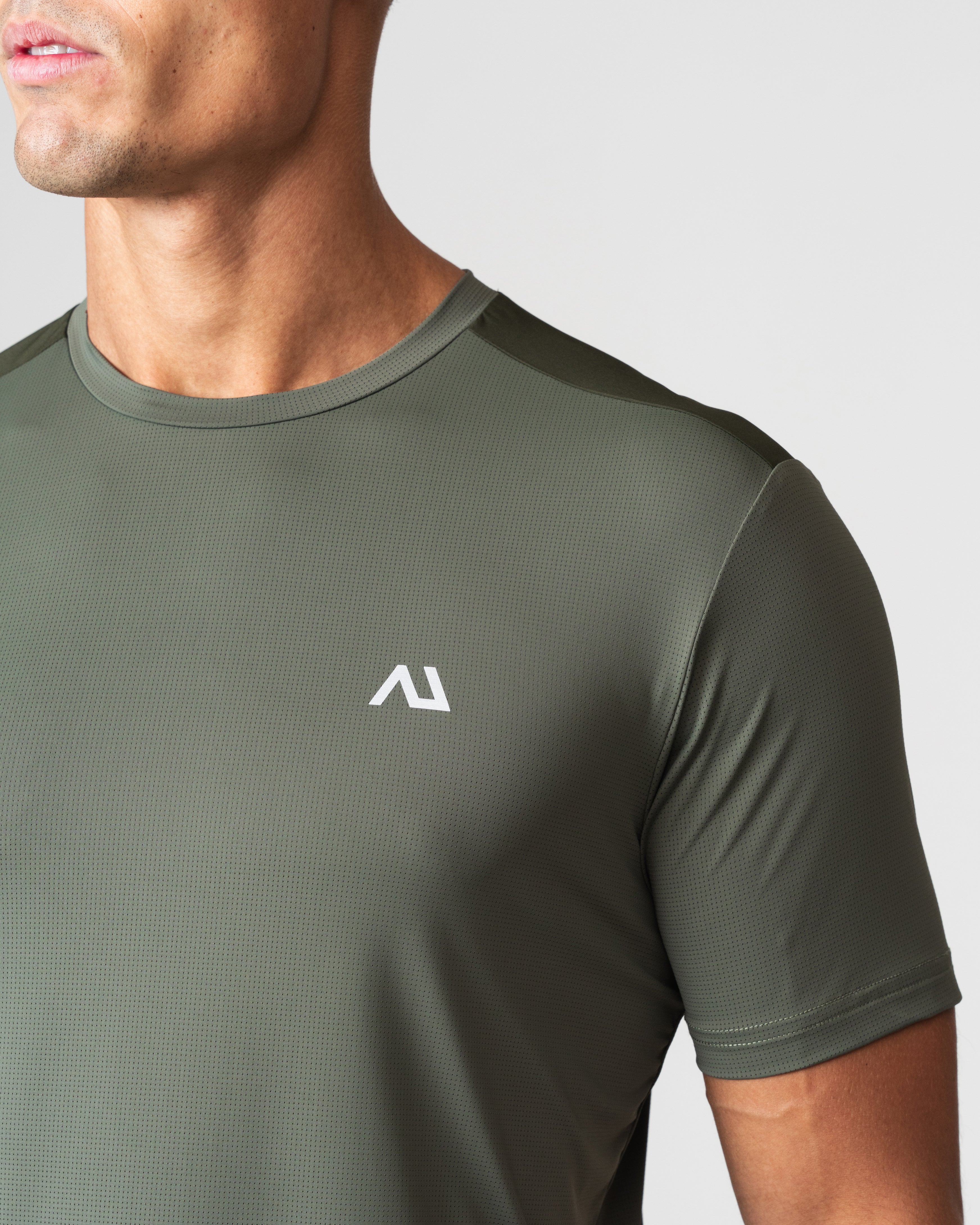 SRG T-Shirt in Deep Olive, close-up of chest logo